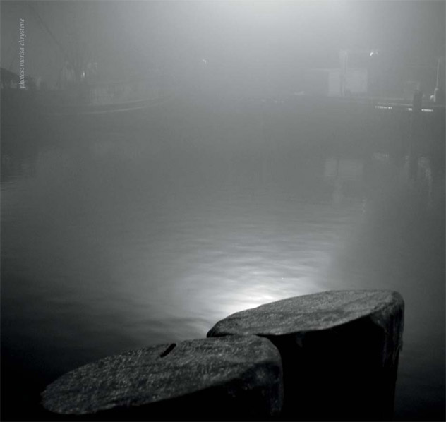 photo by marisa chrystene of Provincetown wharf and boats in fog at night 